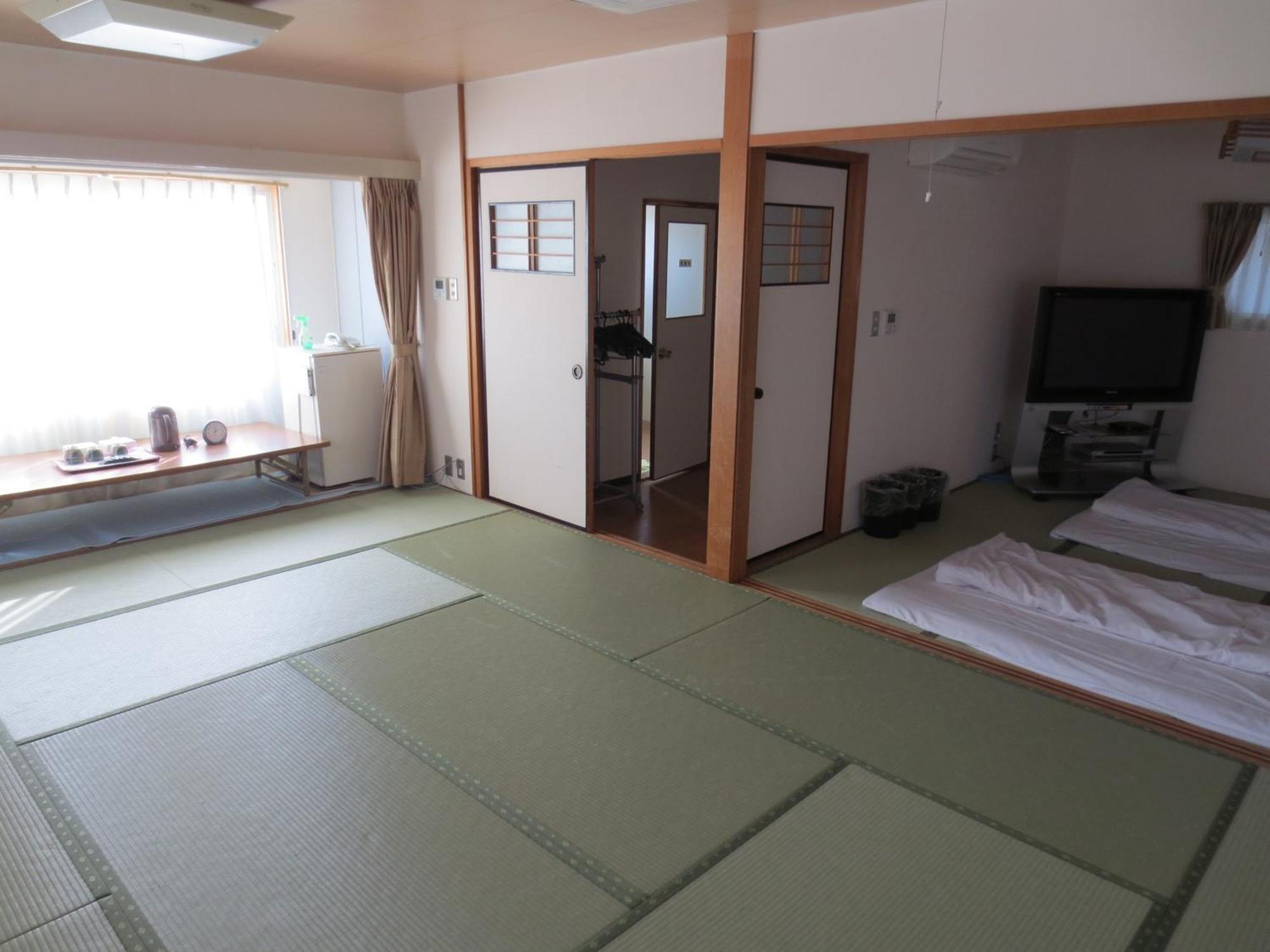 Hotel Minatoya Kōchi Rum bild